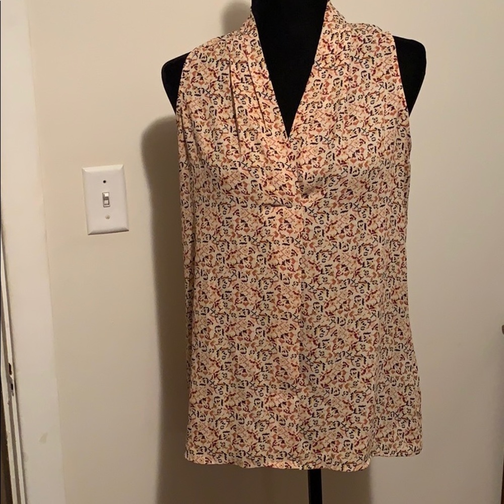 Sleeveless blouse! Fun multi color pattern